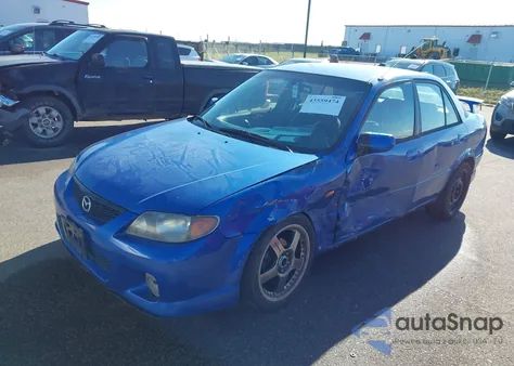 2001 Mazda Protege Mp3 z USA, uszkodzony, nr VIN JM1BJ227210438399